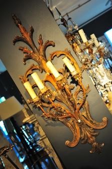 POLYCHROME AND GILT FOUR ARM WALL SCONCE