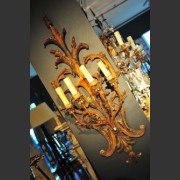 POLYCHROME AND GILT FOUR ARM WALL SCONCE